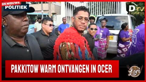 Flitsen vanuit Ocer NDP massa meeting (Suriname)